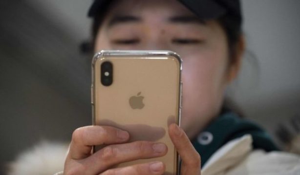 Apple blames China for sales forecast cut